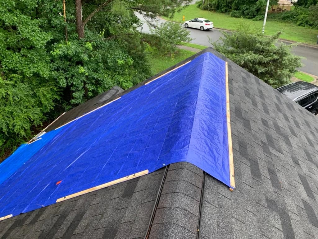 Emergency roof tarping after storm in Marietta